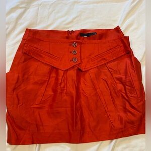 Plastic island skirt, red/orange.
